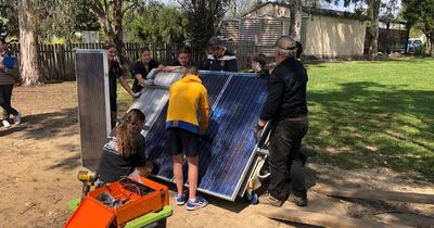 Students construct solar panels and mock-connect them to the grid