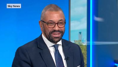 Tory leadership hopeful James Cleverly jumps on Lime bike to race to TV interviews in London traffic