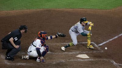 Athletics Bunt Three Straight Times in Extra-Innings Win Over Astros