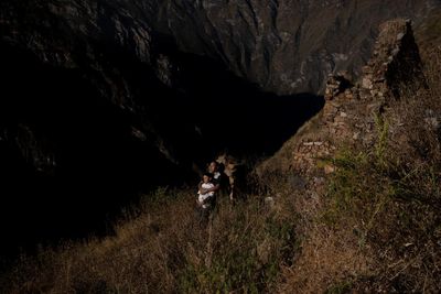 A father and son commune with their ancestors in an Andean ghost village: Víctor Zea Díaz’s best photograph