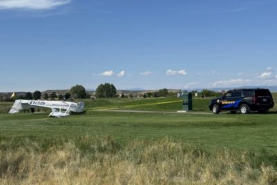2 people walk away after a small plane crashes at a Denver-area golf course