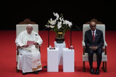 Pope warns of AI dangers, urges fair wages for migrants on Singapore visit