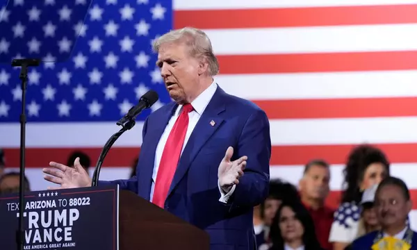 Trump attacks migrants and claims victory over Harris at first rally since debate