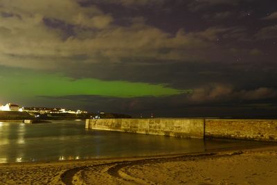 Northern lights: ‘Unbelievable scene’ of green skies as aurora borealis illuminates parts of UK