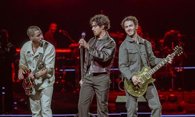 Jonas Brothers review – epic 60-song eras set is full of cheesy joy