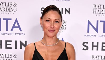 Emma Willis evokes Hollywood glamour wearing black midi dress and chunky heels at the National Television Awards