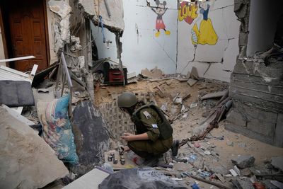 AP PHOTOS: A visit to Gaza reveals rubble, tunnels and new asphalt along Egypt's border