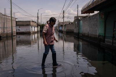 Residents of Mexico City suburb are anxious after living over a month in black sewage water