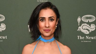 Anita Rani ticks two trends off the list for autumn in her burgundy tank top - it's the layering piece you'll be wearing all season