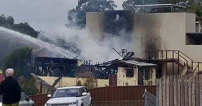 Building destroyed in suspicious fire, police investigate