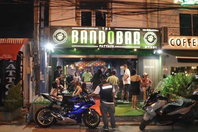 Pattaya pub raid nets illegal Canadian DJ, sword-carrying Brit