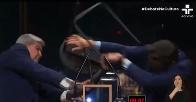 WATCH: Popular journalist beats up right-wing San Paulo politician with metal chair during live TV debate