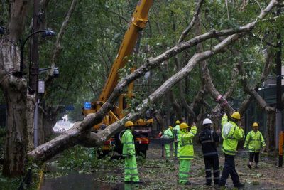 2 people reported dead in China as Typhoon Bebinca is downgraded to a tropical storm