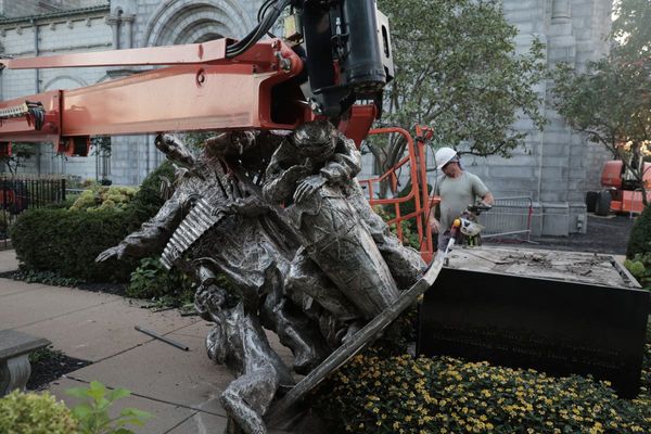 A vandal badly damaged a statue outside a St. Louis cathedral, police say