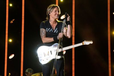 Keith Urban says 'High' is about order and chaos, with songs about love, life and his late father