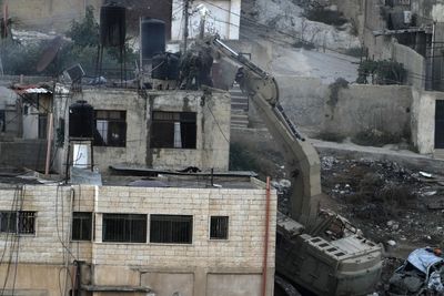 Israeli soldiers filmed pushing bodies off roof in deadly West Bank assault