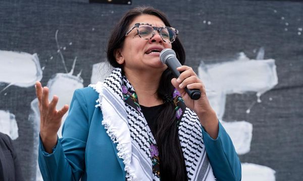 Rashida Tlaib condemns cartoonist for racist image of her with exploding pager