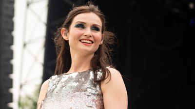 Sophie Ellis-Bextor's chic camel suit and bold red lipstick are the ultimate autumnal combination