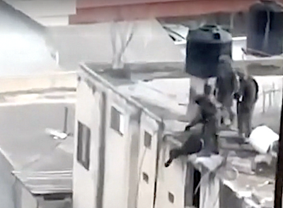 Israel Launches Probe After Its Troops Are Filmed Heaving Palestinian Bodies Off Roof