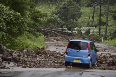 Heavy Rain Triggers Landslides And Floods In Japan