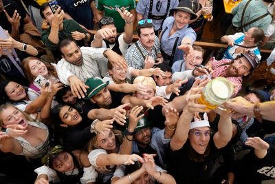 AP PHOTOS: Thousands of beer lovers descend on Munich for Oktoberfest