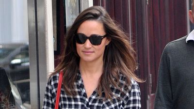 Pippa Middleton elevates a checked shirt and jeans with vibrant red accessories – this classy colour combination will never go out of fashion