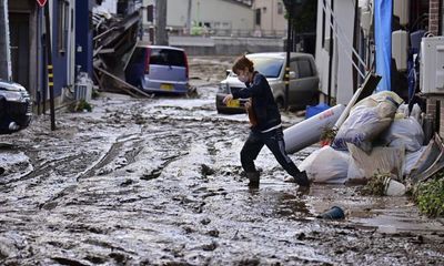 Japan floods: six dead after rain pounds region still recovering from earthquake