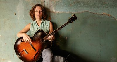 “I developed my playing style from being in bars, playing solo. People are shouting over your music... silences make them notice themselves – and then they notice you”: Ani DiFranco on the dark arts of acoustic –and why she’s over online ‘performers’