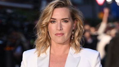 Kate Winslet's versatile navy mini dress and sleek white blazer make for the most classy transitional colour palette