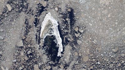 Earth from space: Iconic 'Star Trek' symbol shines brightly in sea of muddy Arctic sea ice