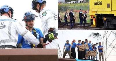 Police remove climate protesters from coal train in Newcastle