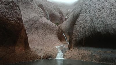 Record-breaking storms leave Uluru with waterfalls