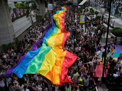 AP PHOTOS: As Thailand approves same-sex marriage, a couple celebrates feeling freed