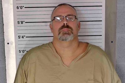 Kentucky sheriff charged with fatally shooting a judge pleads not guilty in first court appearance