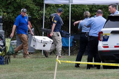 Philadelphia police exhume 8 bodies from a potter's field in the hope DNA testing can help ID them