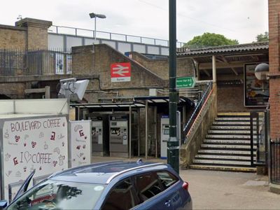 Man fighting for life after being stabbed at Barnes railway station as rush hour train services cancelled