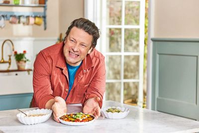 Twenty-five years after he became the Naked Chef, Jamie Oliver is back with another cookbook