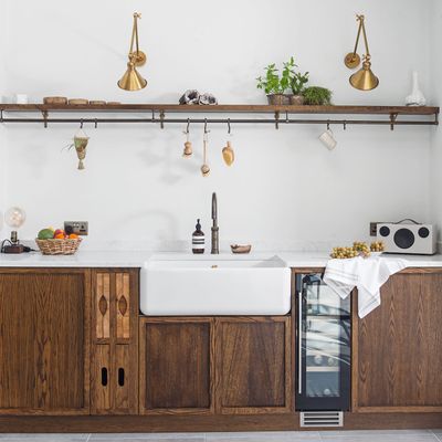 Natural materials, hidden appliances and lots of light ensure this kitchen is bright and tranquil