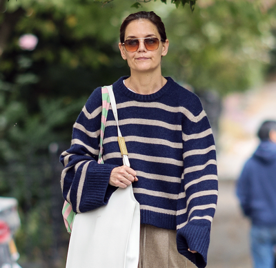 Katie Holmes Puts a French Girl Spin on Her Cozy Striped Sweater With $150 Ballet Flats