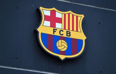 Barcelona fans banned for one Champions League game for Nazi-style flag