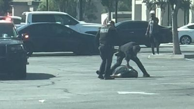 New Footage Shows California Cop Brutally Punching Man Who Had Just Been Shot to Death