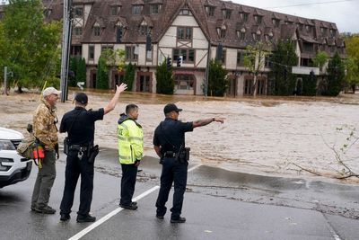 Torrential rains flood North Carolina mountains and create risk of dam failure