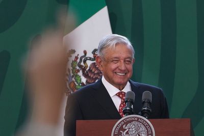 Mexico's president touts austerity on his way out of office but lavishes largesse on friends