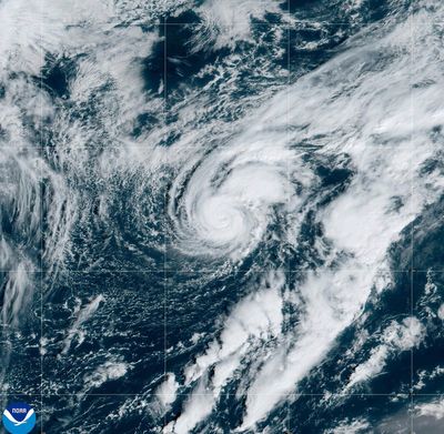 Hurricane Isaac and Tropical Storm Joyce move through the open Atlantic far from land