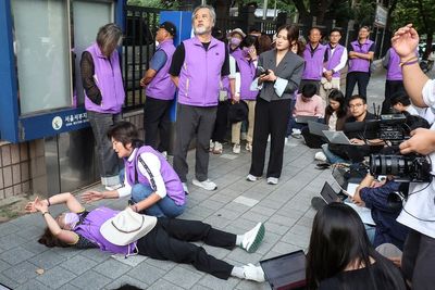 South Korean court gives prison sentences to 3 police officers over deadly 2022 Halloween crush