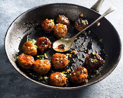 Savory-sweet soy basting sauce transforms ground chicken into izakaya-style meatballs