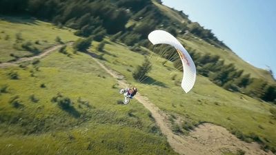 Red Bull Dirt Biker Jumps Off a Cliff, Paraglides All the Way Down