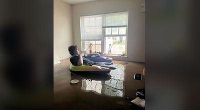 Viral Photo Claims to Show College Student Chilling Out in Flooded Dorm After Hurricane Helene