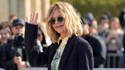 Meg Ryan just elevated grey joggers in the chicest possible way with a smart coat and chunky heeled boots