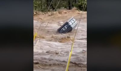 Meteorologist Posts Viral Video Claiming to Show Casket Floating in Hurricane Floodwaters: 'Horrific'